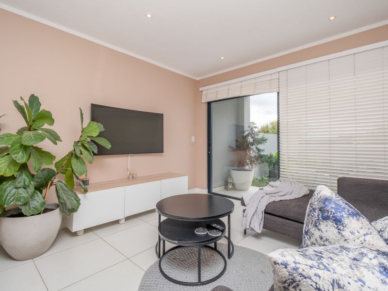 Ground-floor ease. Private garden living. Effortless convenience. - Photo 7