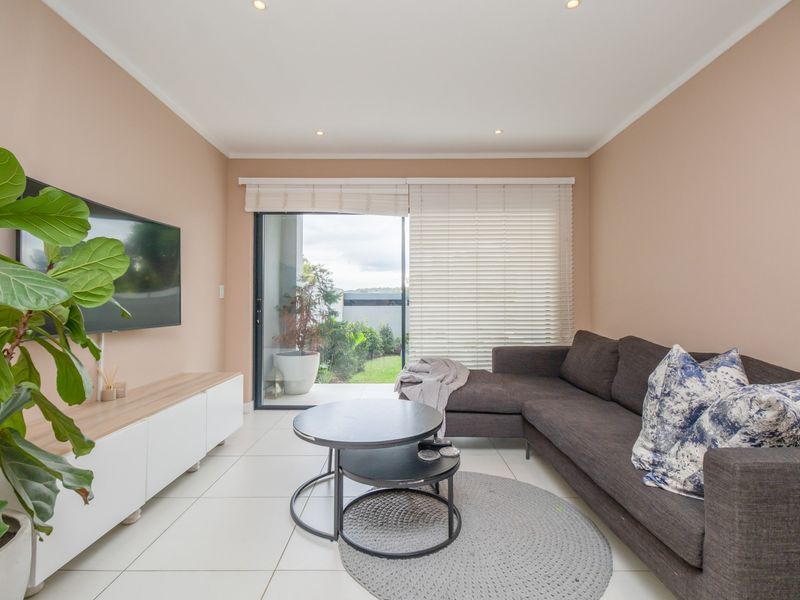 Ground-floor ease. Private garden living. Effortless convenience. - Photo 6