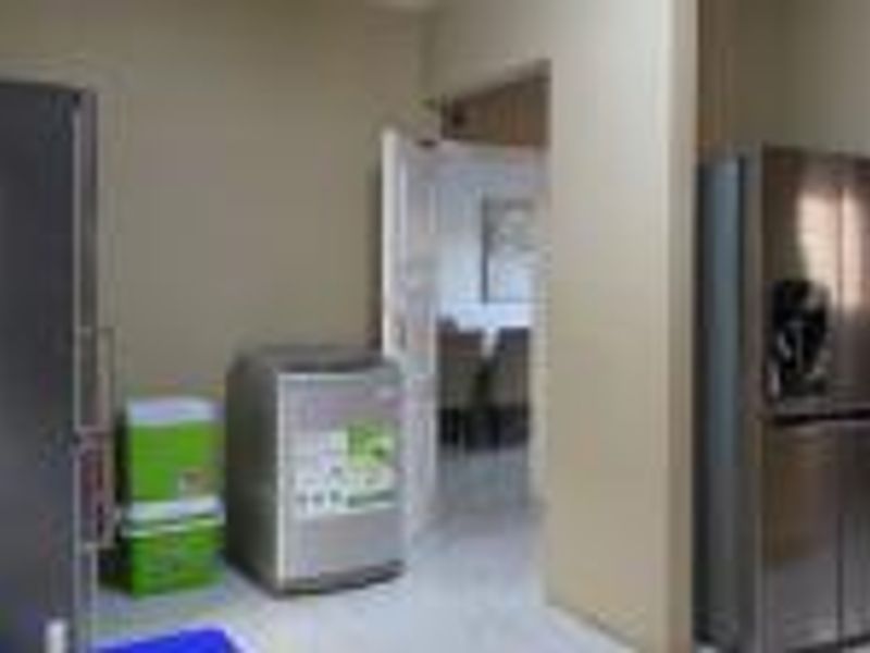 Expansive 6-Bedroom Double-Storey Home - Photo 9