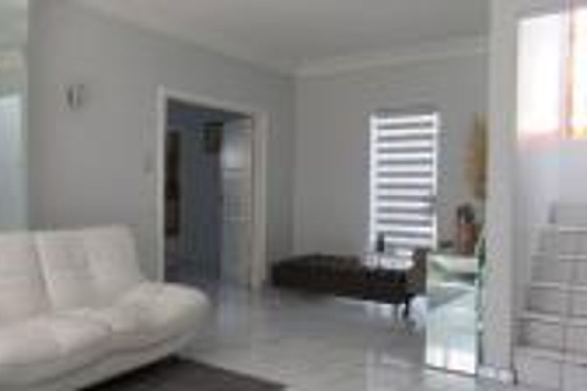 Expansive 6-Bedroom Double-Storey Home - Photo 2