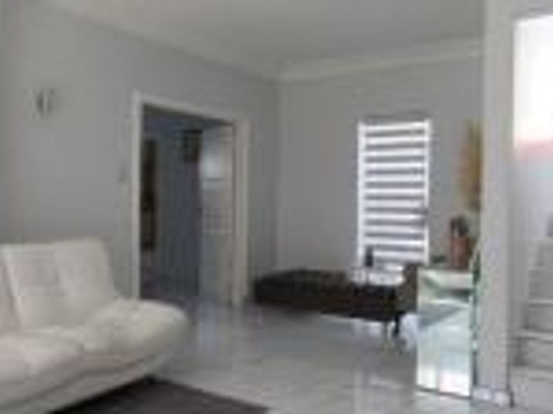 Expansive 6-Bedroom Double-Storey Home - Photo 2