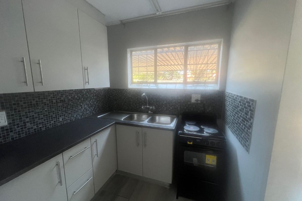 Neat and Renovated Duplex with Private Garden - Photo 4
