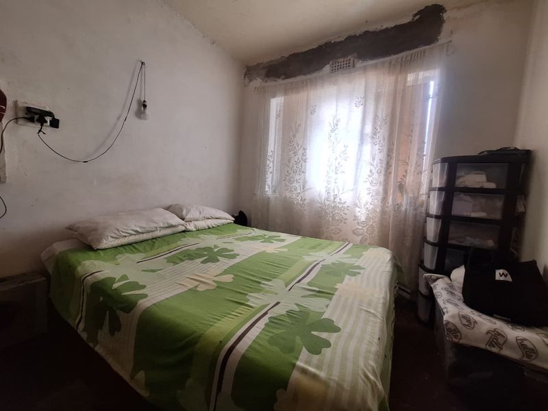 Unlock the Potential: 3-Bedroom Fixer-Upper with Endless Possibilities - Photo 6