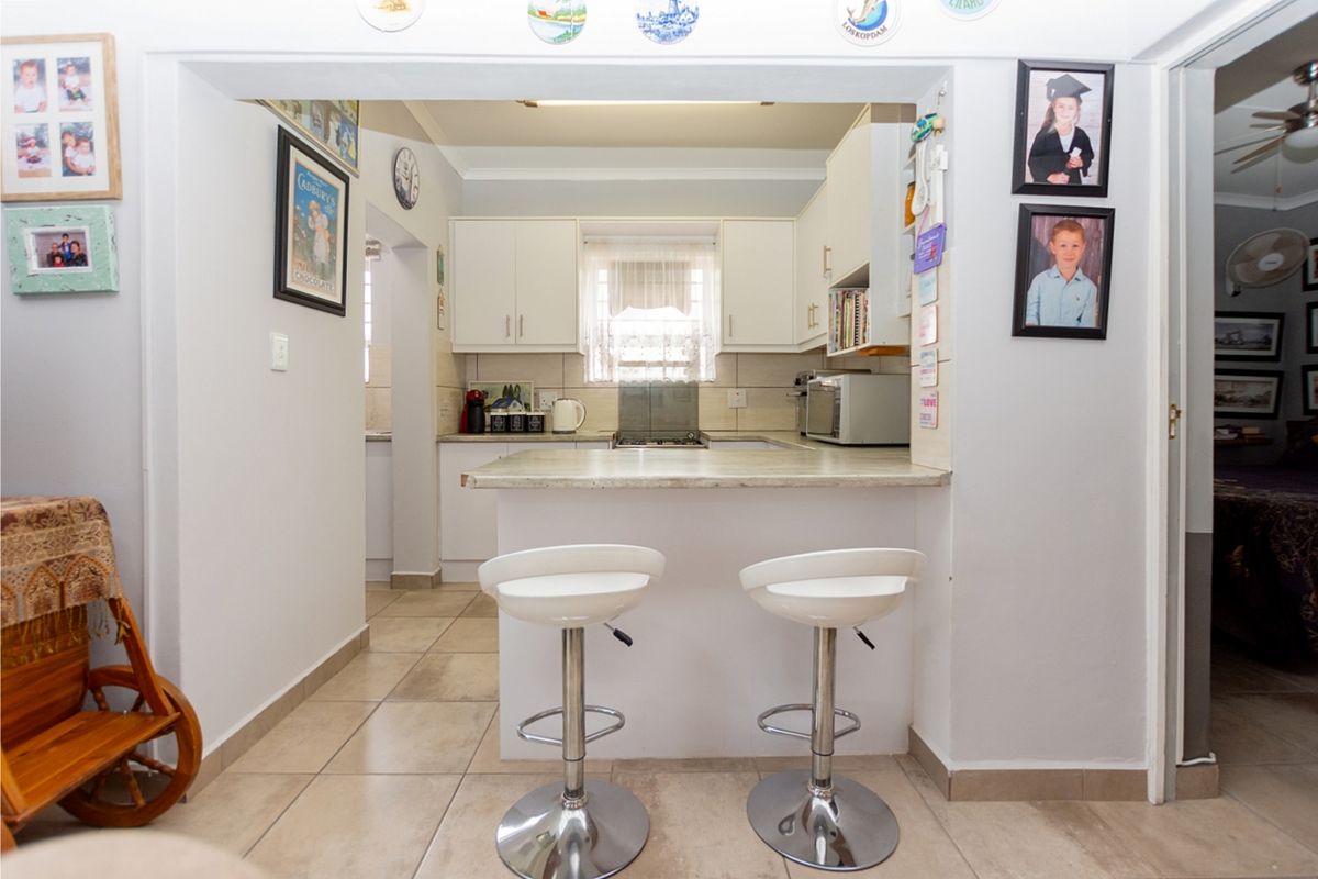 You are invited to explore this lovely three bedroom house. - Photo 4