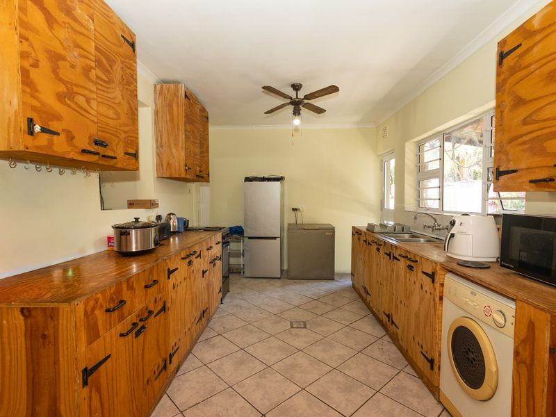 Spacious Family Home with 2 Income-Generating Granny Flats & Pool - Photo 7