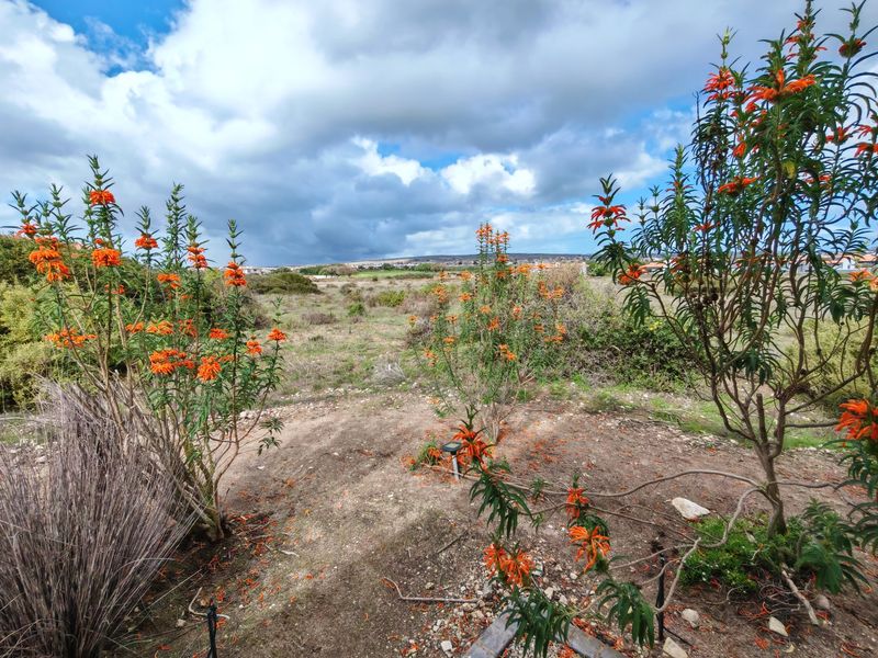 Enjoy Secure Golf Estate Living with Greenbelt Views - Photo 3