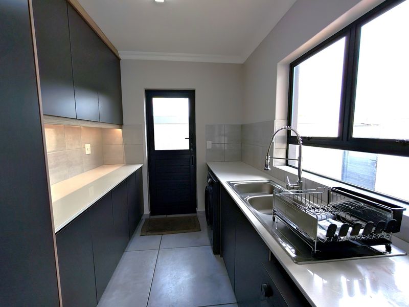 Enjoy Secure Golf Estate Living with Greenbelt Views - Photo 9