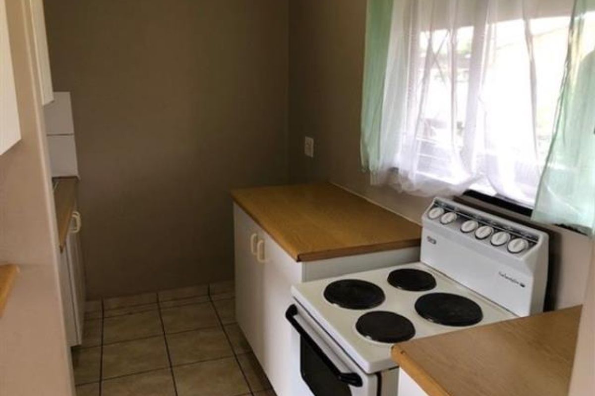 Cute & Neat 1-Bedroom Apartment in Secure Established Complex - Photo 4