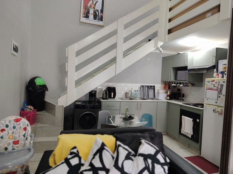 Modern 1 Bedroom Apartment with Loft - Photo 9