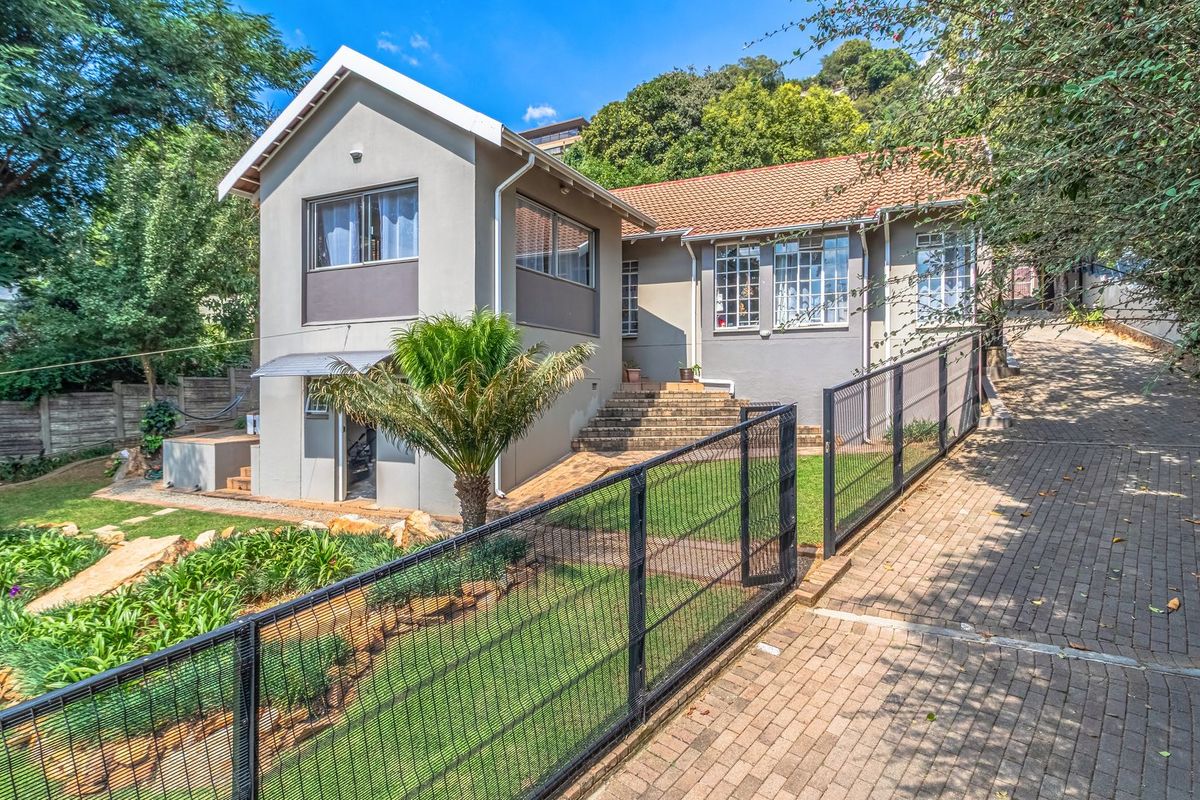 Prime Location & Income Potential! Your Dream Home Awaits! - Photo 2