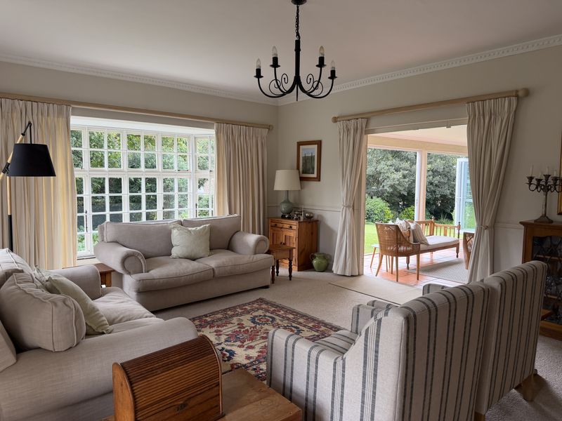 Charming Family Living with Space, Versatility & Timeless Appeal in Wembley - Photo 5