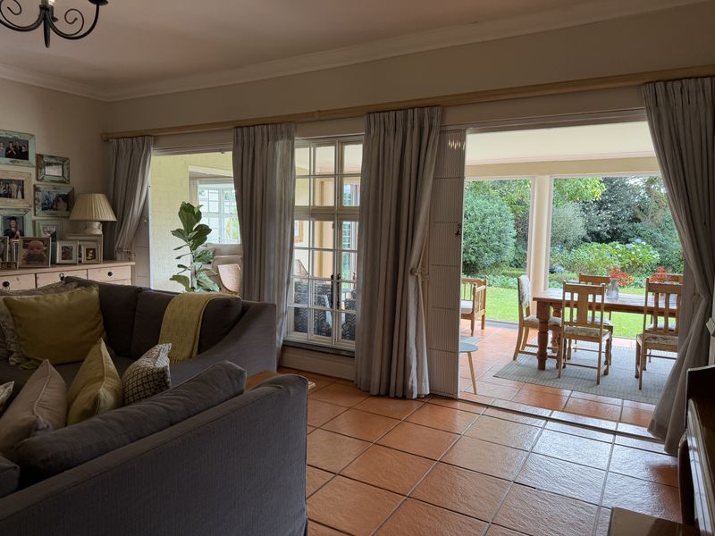 Charming Family Living with Space, Versatility & Timeless Appeal in Wembley - Photo 9