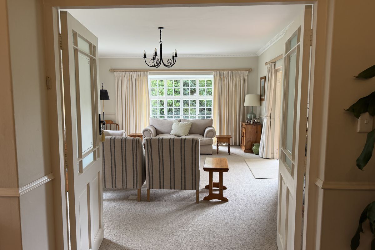 Charming Family Living with Space, Versatility & Timeless Appeal in Wembley - Photo 3