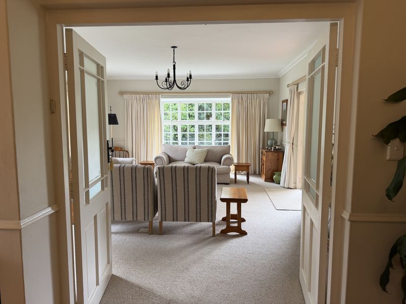 Charming Family Living with Space, Versatility & Timeless Appeal in Wembley - Photo 3