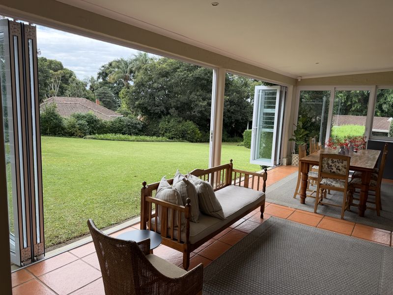 Charming Family Living with Space, Versatility & Timeless Appeal in Wembley - Photo 6