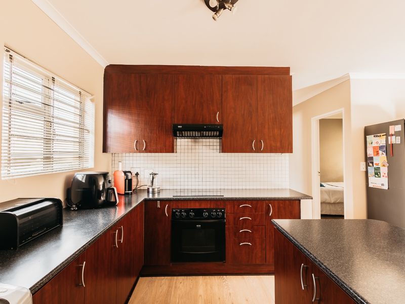 Charming 3-Bedroom Home in the secure Solara Complex! - Photo 2