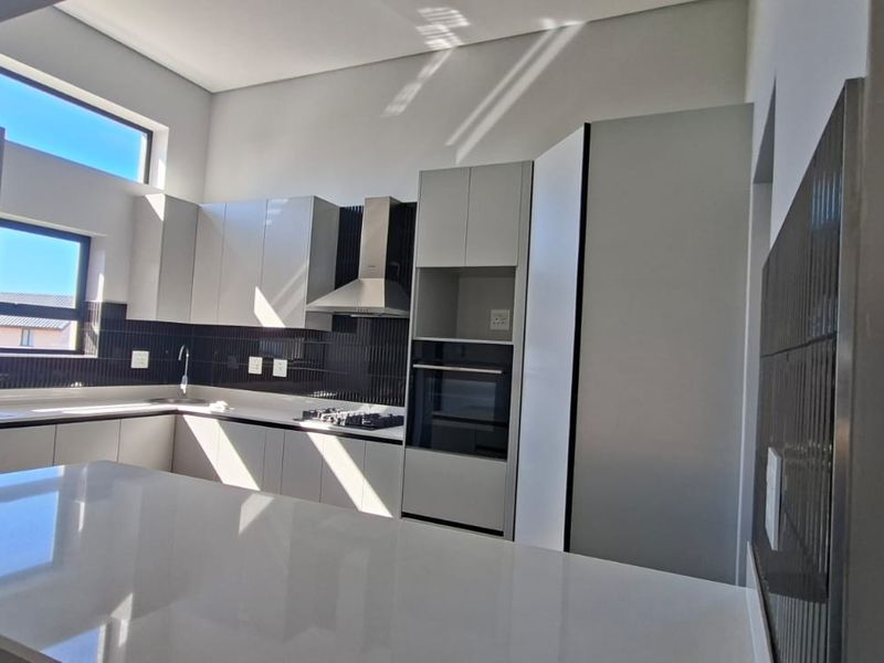 Be the First to Live Here! Stunning New Home in Hartland Estate - Photo 10