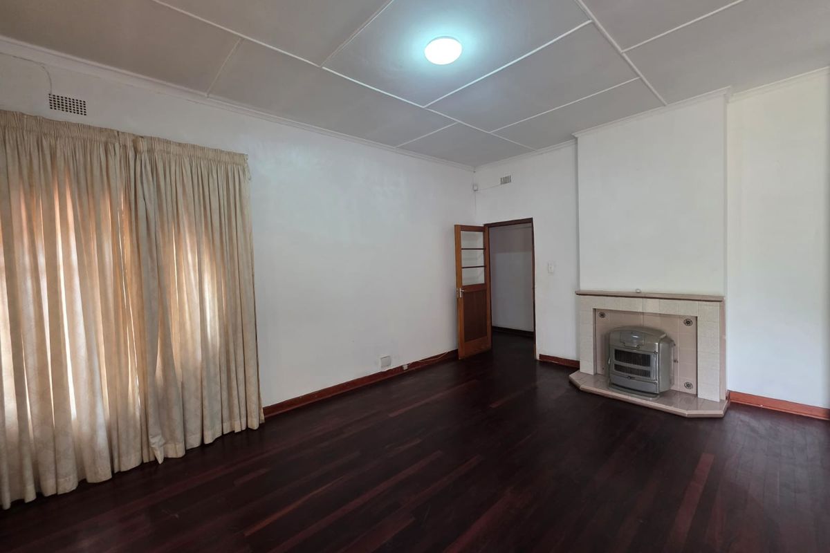 Spacious & Charming 3-Bedroom Home with Massive Yard - Photo 2