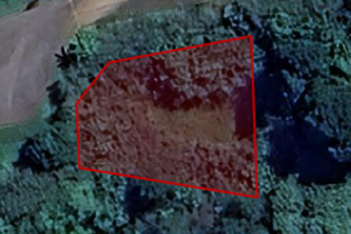 An aerial satellite view showing the boundaries of the vacant residential land plot.