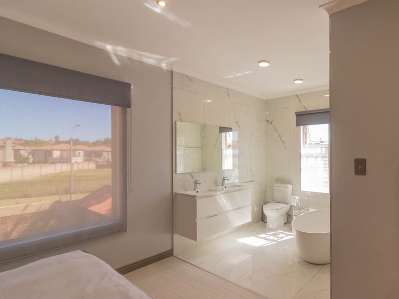 Secure Estate Living with Generator, Pool & Spacious Entertaining Areas in Glen Marais - Photo 8
