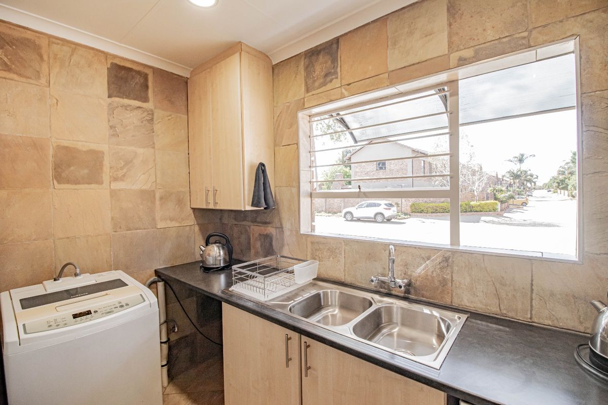 Secure Estate Living with Generator, Pool & Spacious Entertaining Areas in Glen Marais - Photo 4