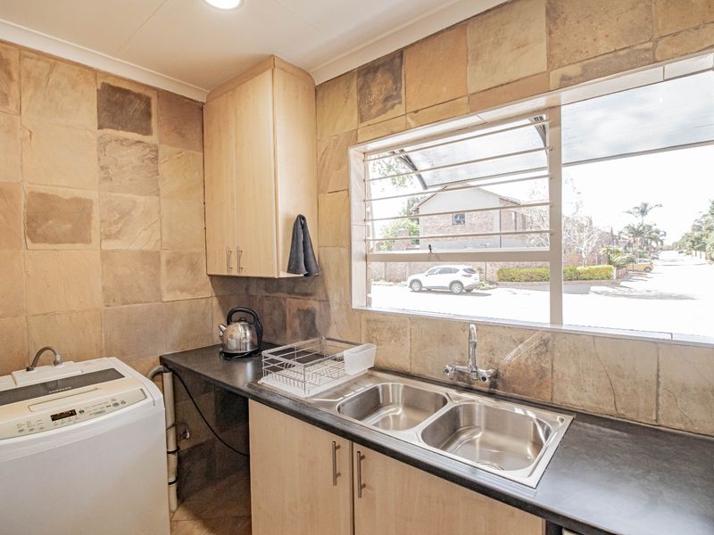 Secure Estate Living with Generator, Pool & Spacious Entertaining Areas in Glen Marais - Photo 4