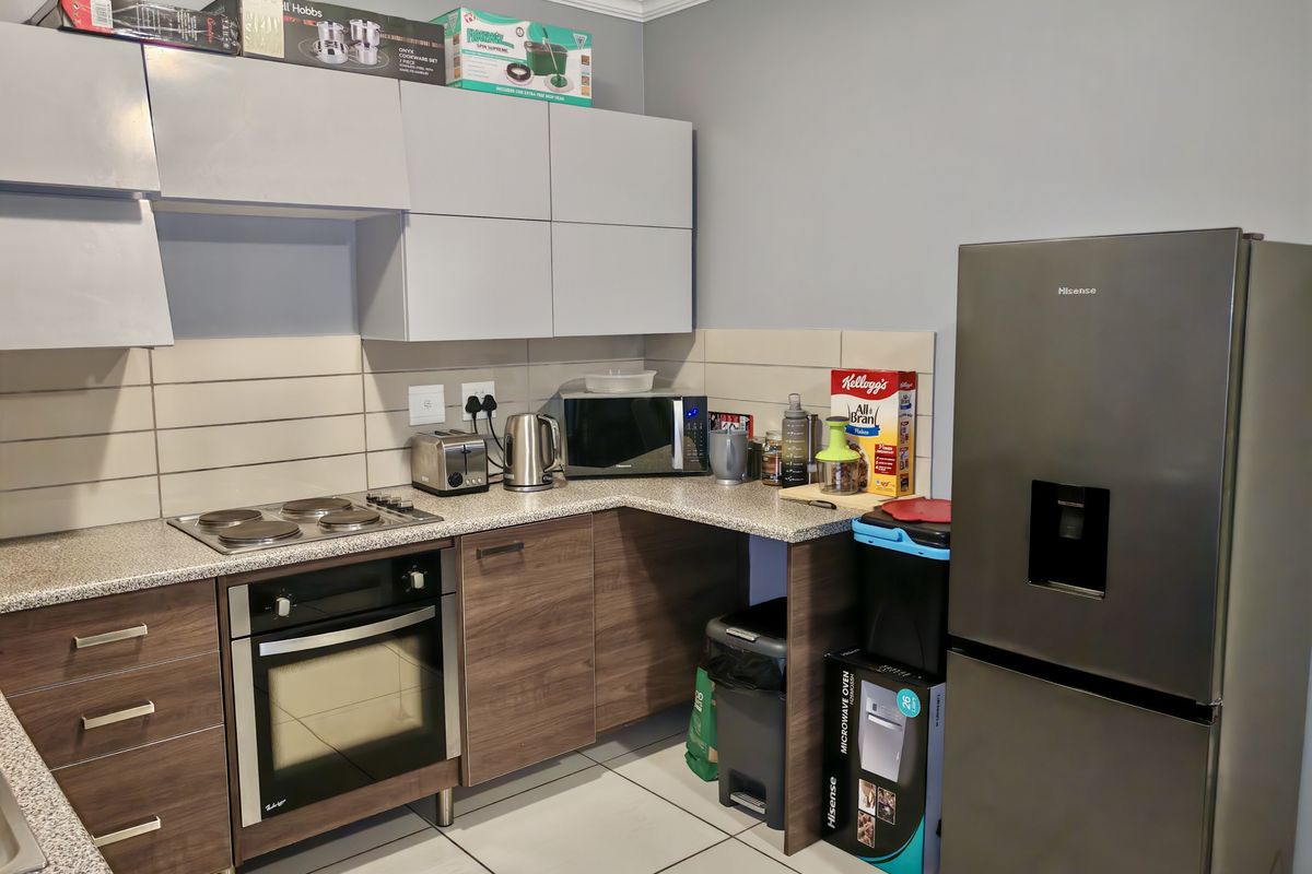 Investor’s Dream – Top-Floor Unit with Strong Appeal - Photo 4