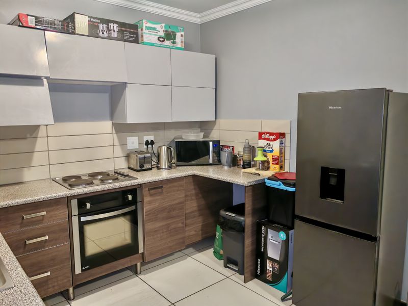 Investor’s Dream – Top-Floor Unit with Strong Appeal - Photo 4