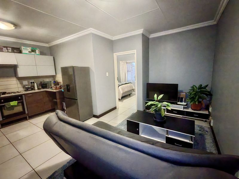 Investor’s Dream – Top-Floor Unit with Strong Appeal - Photo 2