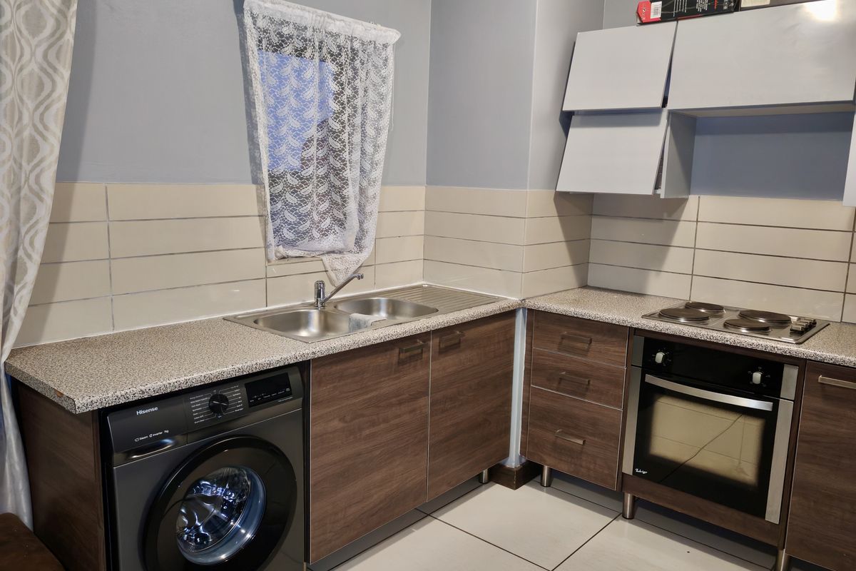 Investor’s Dream – Top-Floor Unit with Strong Appeal - Photo 5