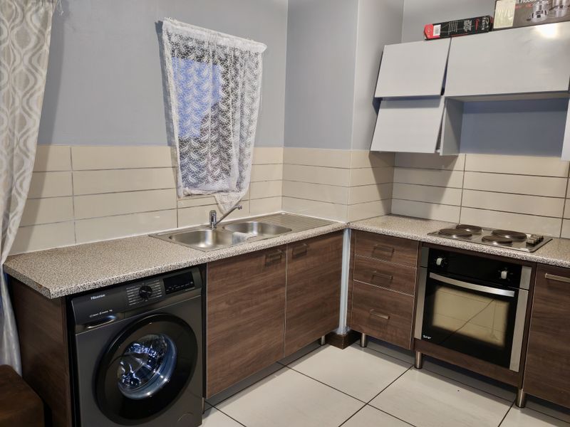 Investor’s Dream – Top-Floor Unit with Strong Appeal - Photo 5