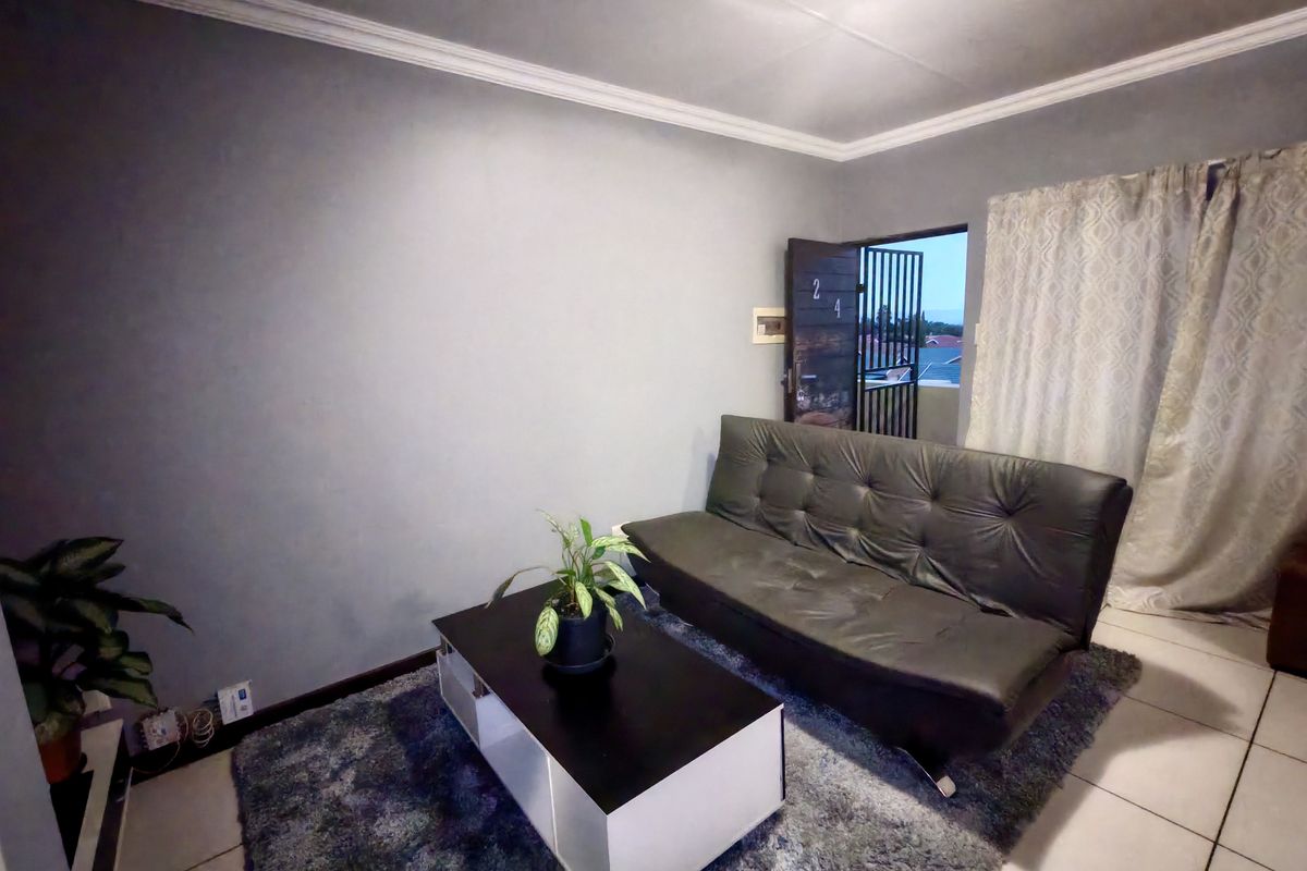 Investor’s Dream – Top-Floor Unit with Strong Appeal - Photo 3