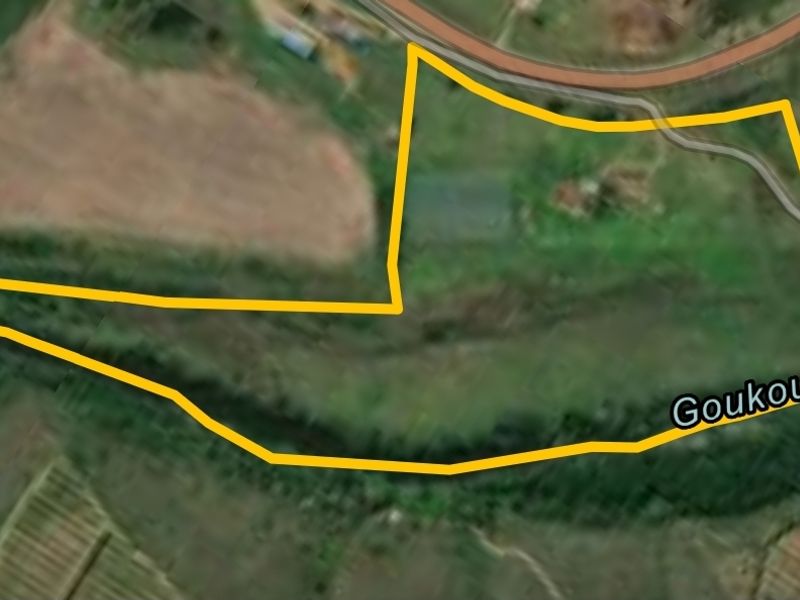 Aerial view of the farm property showing the land boundary and surrounding landscape.