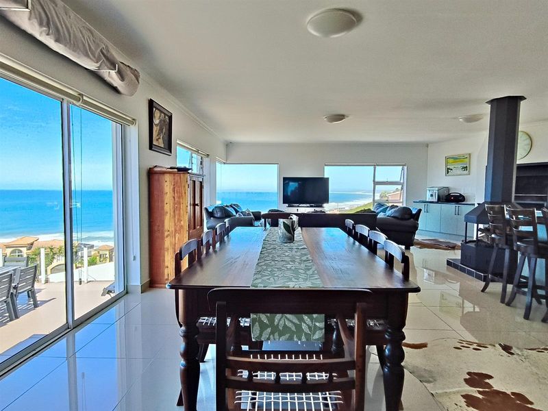 Modern coastal retreat with panoramic ocean views - Photo 6