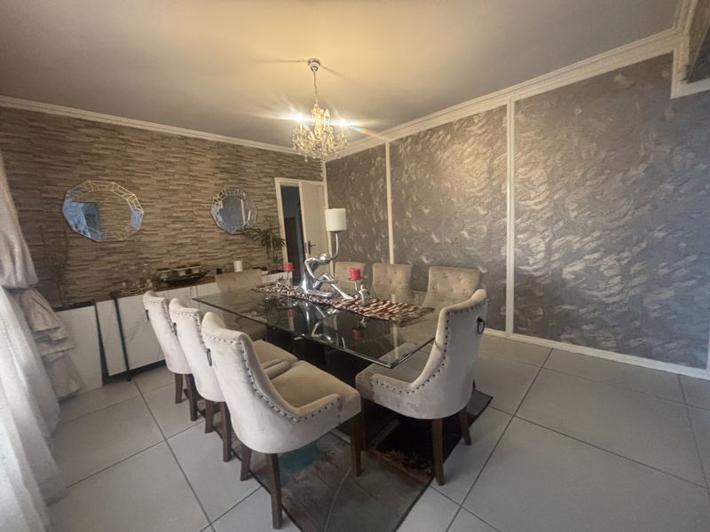 Elegantly Designed Home in Secure Estate - Photo 5