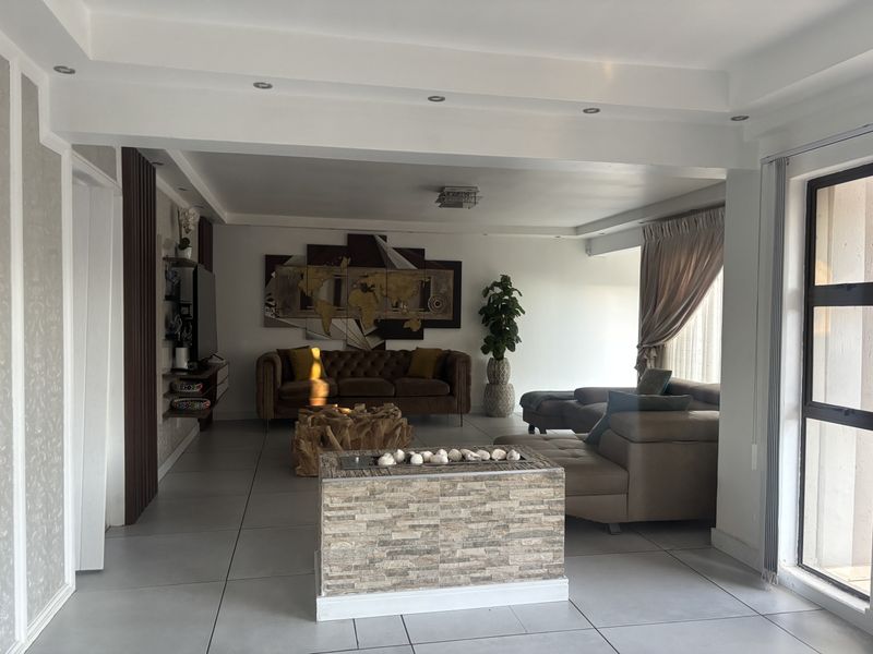 Elegantly Designed Home in Secure Estate - Photo 7