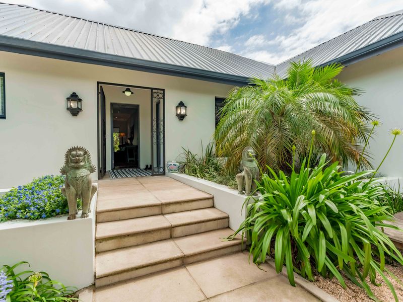 Expansive 5 Bedroom Family Estate Offering Single Level Accessibility and Income Potential. - Photo 5