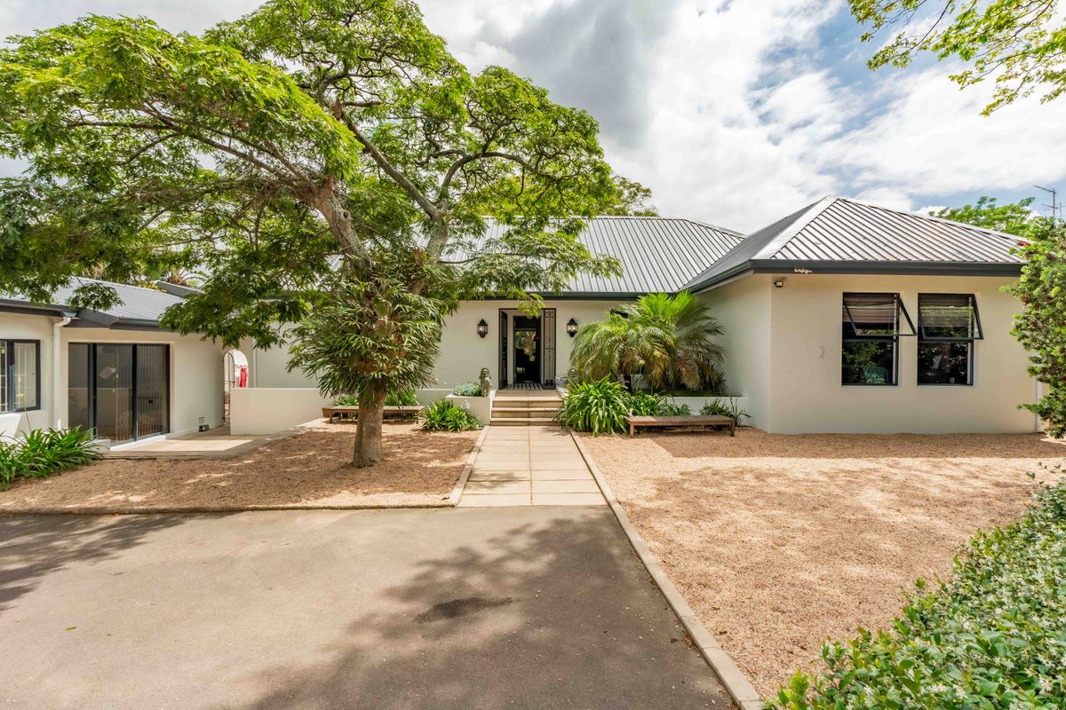 Expansive 5 Bedroom Family Estate Offering Single Level Accessibility and Income Potential. - Photo 4