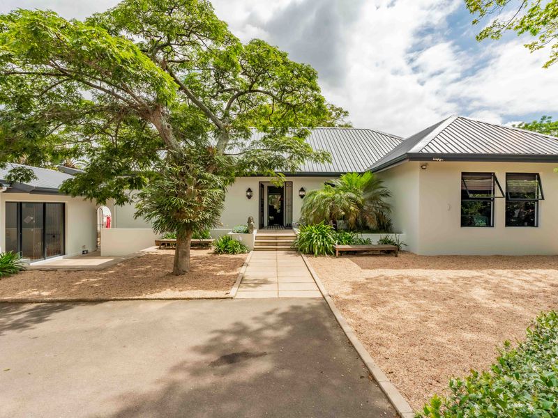 Expansive 5 Bedroom Family Estate Offering Single Level Accessibility and Income Potential. - Photo 4