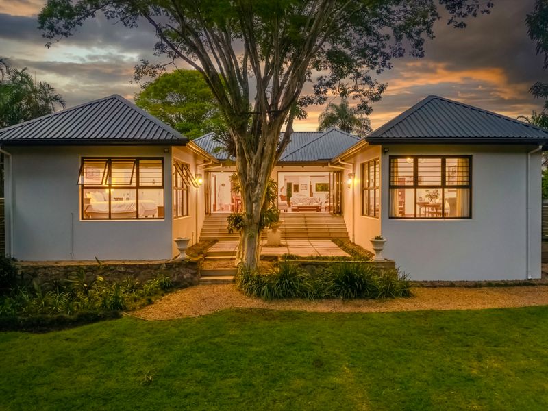 Expansive 5 Bedroom Family Estate Offering Single Level Accessibility and Income Potential. - Photo 2