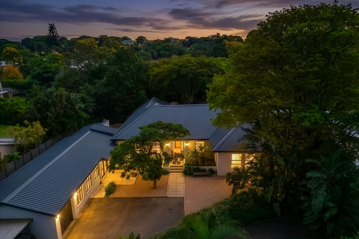 Expansive 5 Bedroom Family Estate Offering Single Level Accessibility and Income Potential. - Photo 3