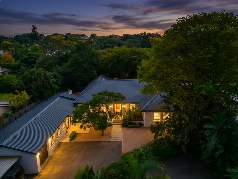 Expansive 5 Bedroom Family Estate Offering Single Level Accessibility and Income Potential. - Photo 3