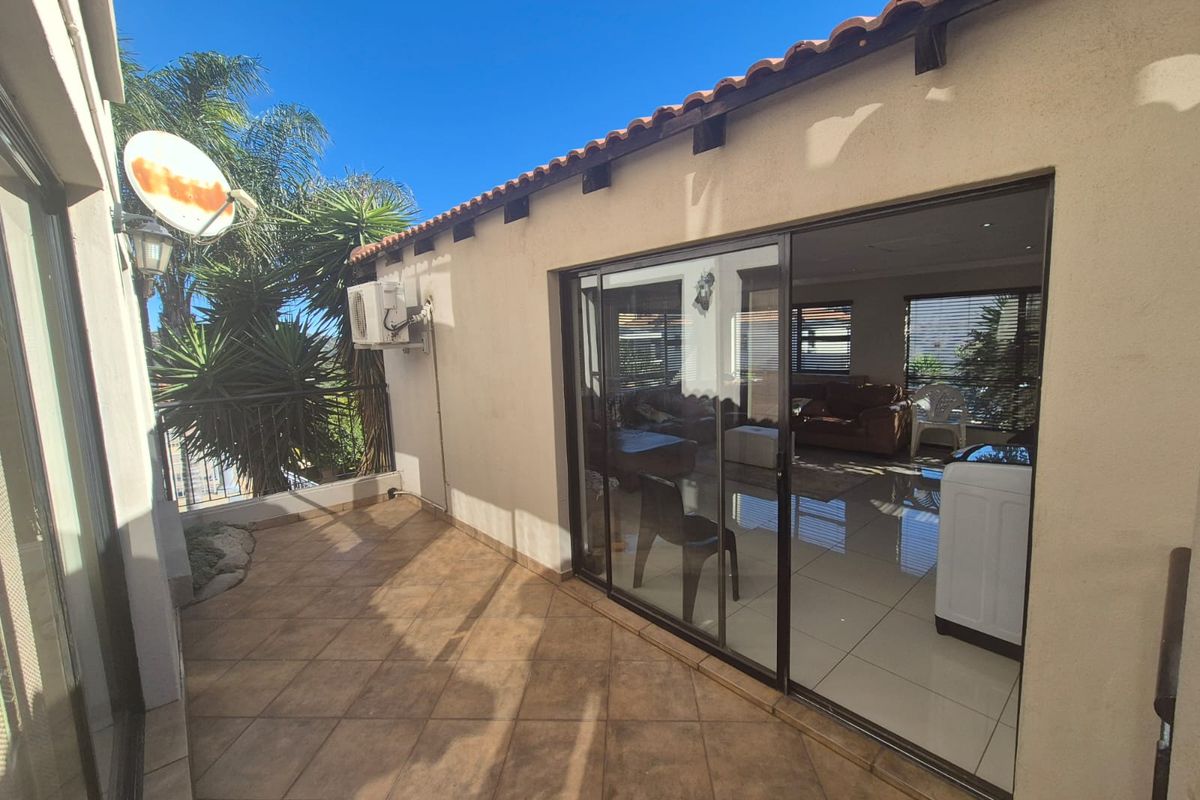 Experience Secure Estate Living in This Stunning Double-Storey Home - Photo 5