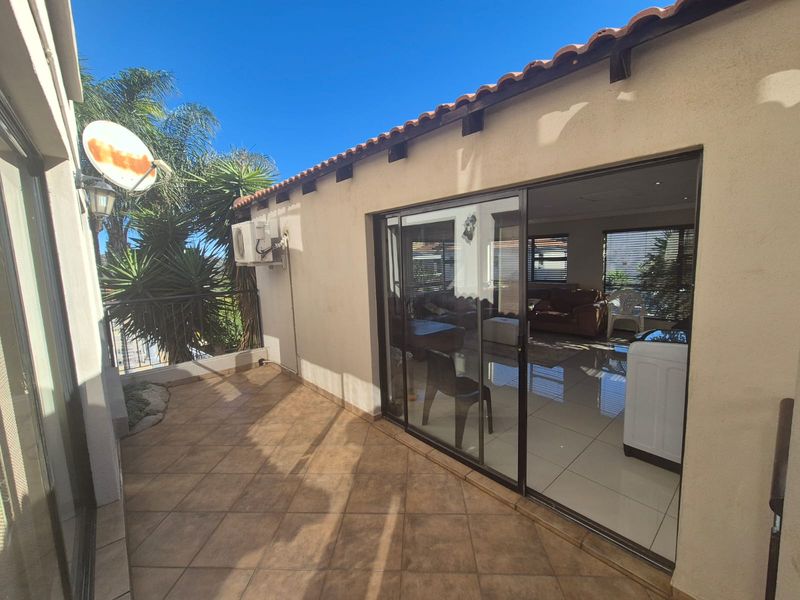 Experience Secure Estate Living in This Stunning Double-Storey Home - Photo 5