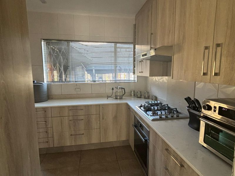 Spacious home featuring a spacious flatlet and a pool. - Photo 9