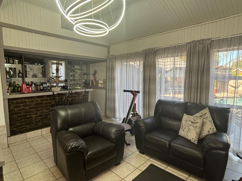 Spacious home featuring a spacious flatlet and a pool. - Photo 5