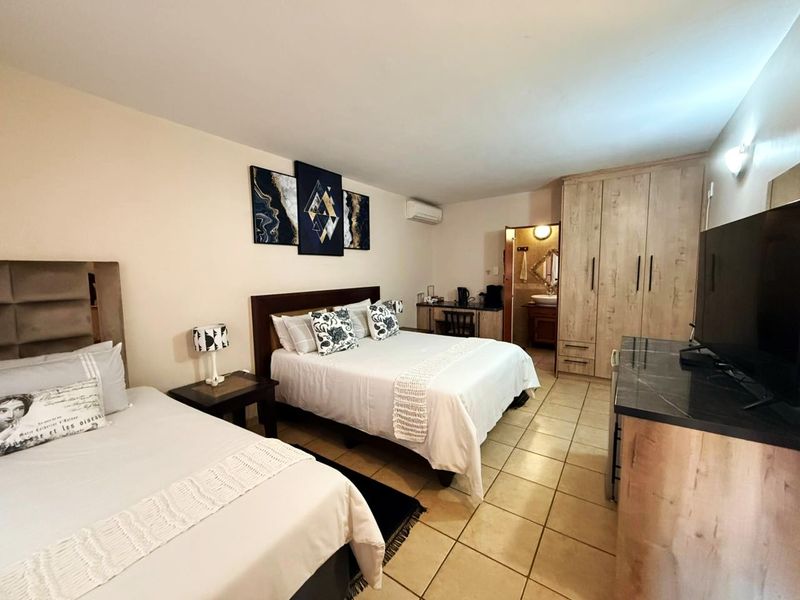 Spacious 7-bedroom Guest House for sale in Cashan, Rustenburg – a perfect investment opportunity! - Photo 10