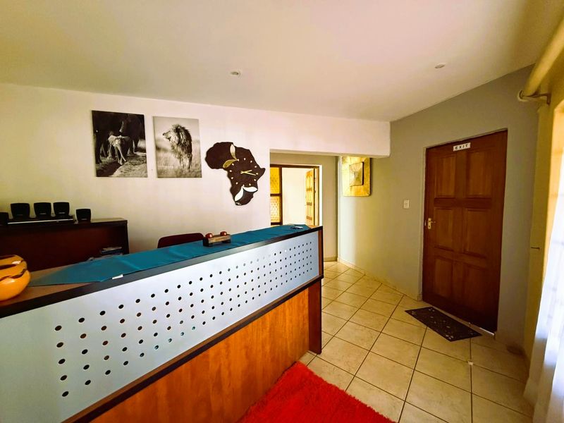 Spacious 7-bedroom Guest House for sale in Cashan, Rustenburg – a perfect investment opportunity! - Photo 3