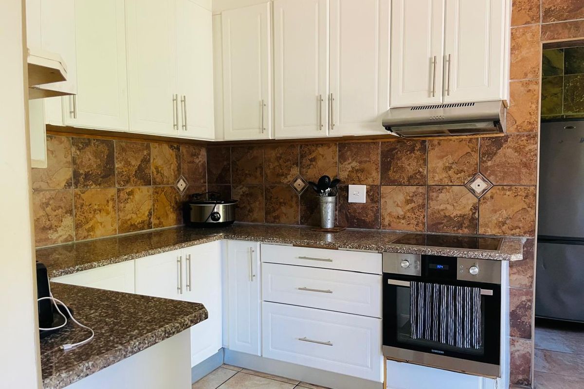 Step into this beautifully designed family home that offers the perfect balance of comfort, style, a - Photo 4