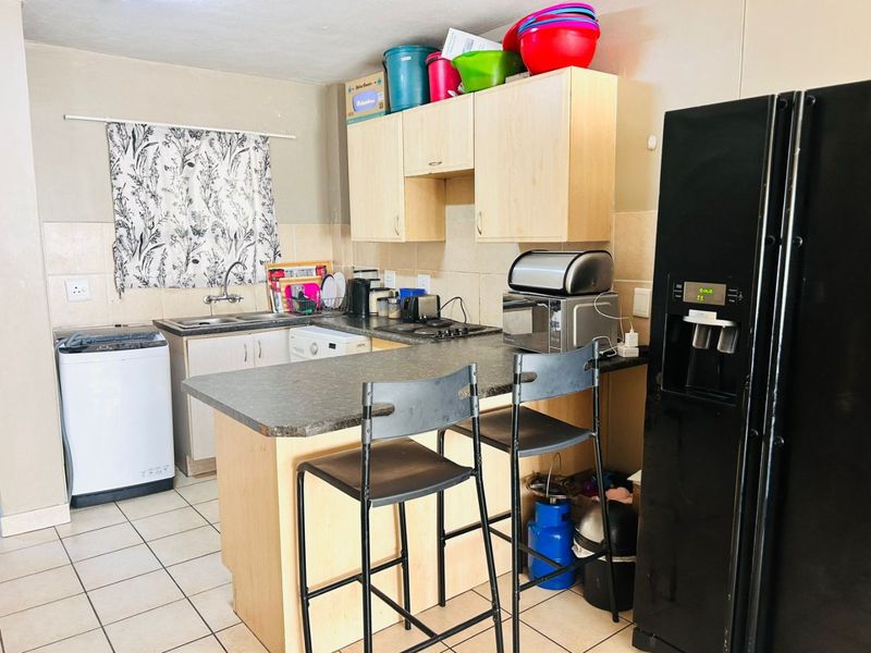 Neat and Secure 2-Bedroom Apartment in a Popular Complex - Photo 4